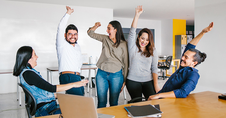 Dr. David Goatley being installed as president of Fuller Theological Seminary in January 2023 Five people in an office cheering with excitement