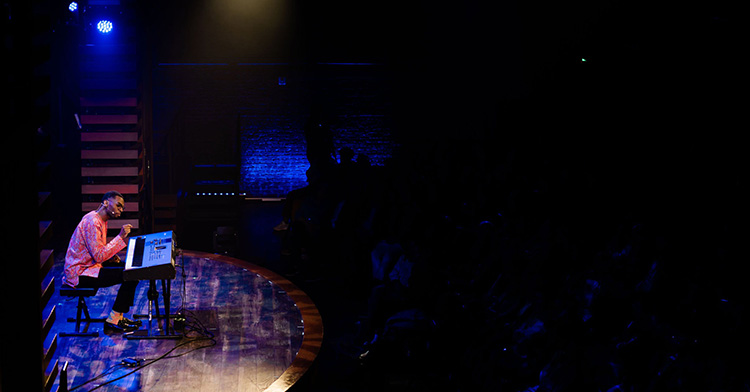 Dr. David Goatley being installed as president of Fuller Theological Seminary in January 2023 Picture of man on a stage playing the keyboard