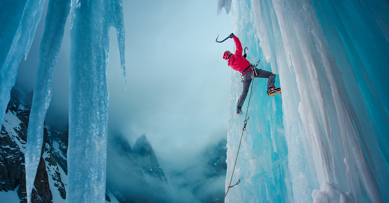 Man ice climbing