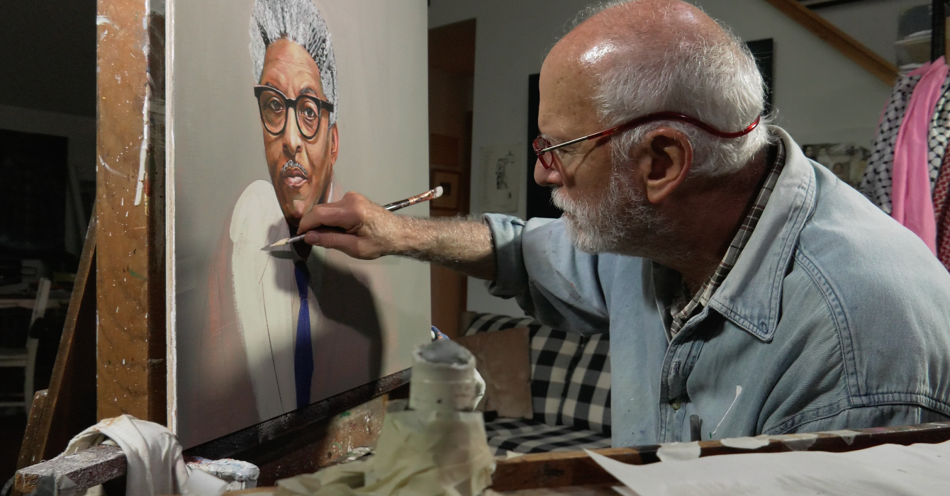 Robert Shetterly paints a portrait of Bayard Rustin in his studio.