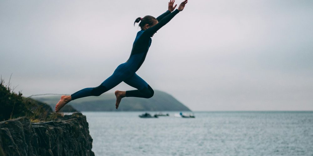 Woman cliff jumping