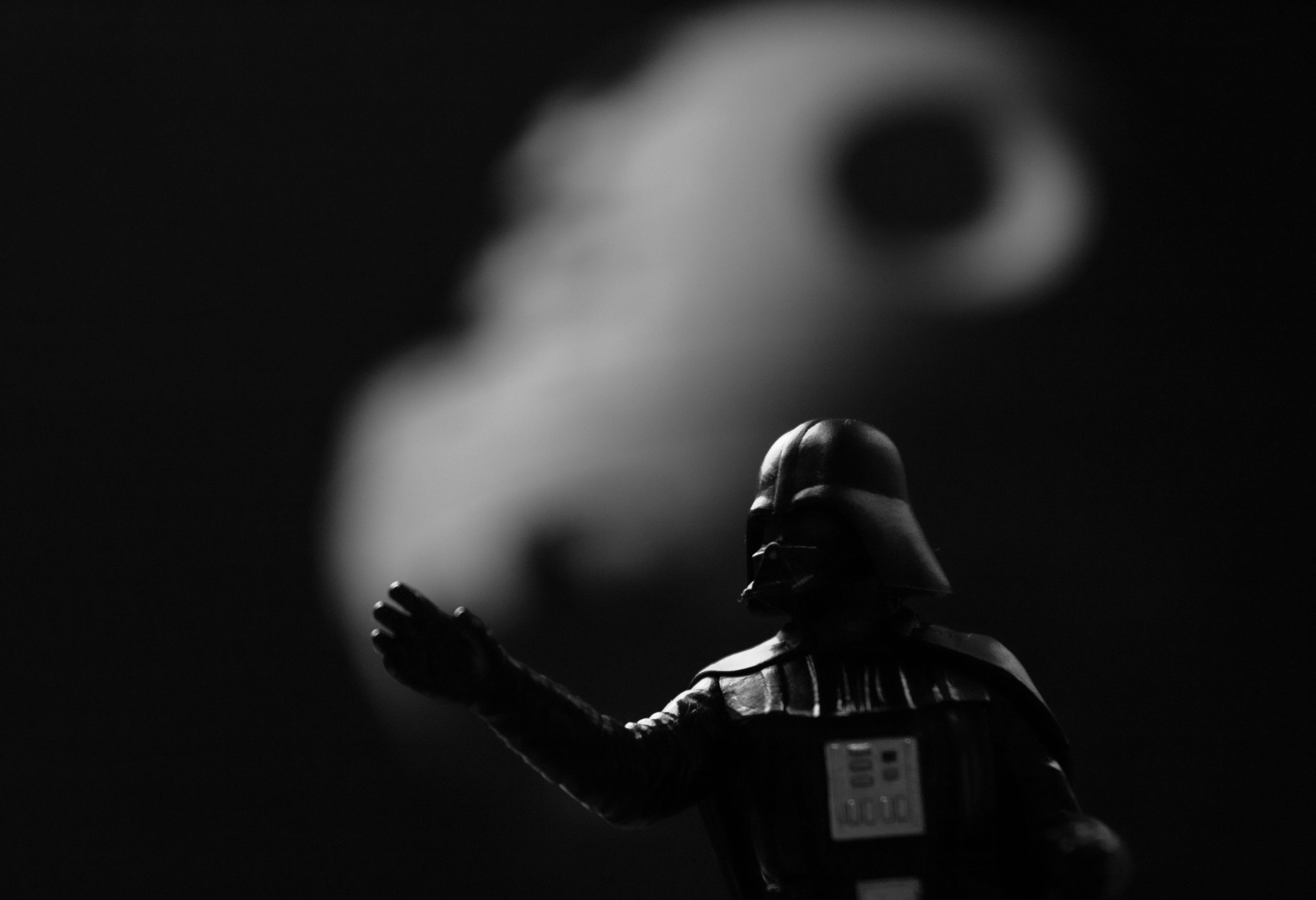 Darth Vadar with the Death Star in the background behind him